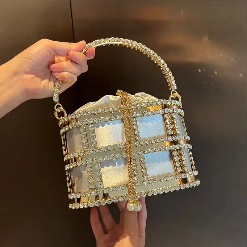 Glamorous Rhinestone Embellished Metal Top Handle Evening Clutch with Rhinestones and Pearl Accent