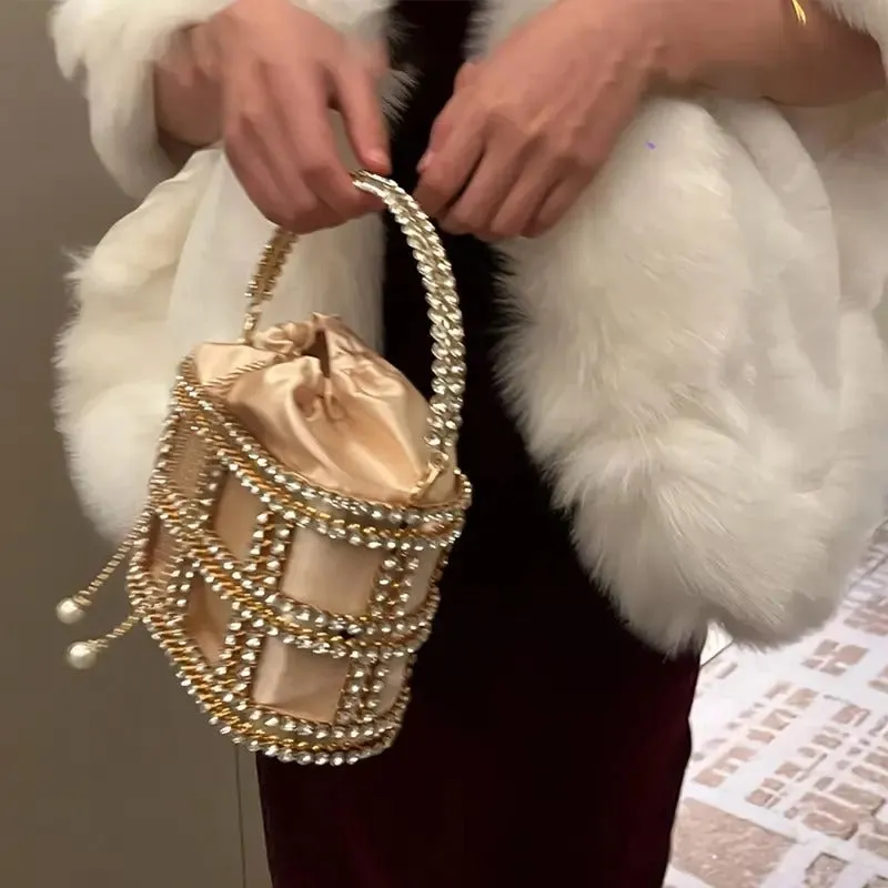 Glamorous Rhinestone Embellished Metal Top Handle Evening Clutch with Rhinestones and Pearl Accent